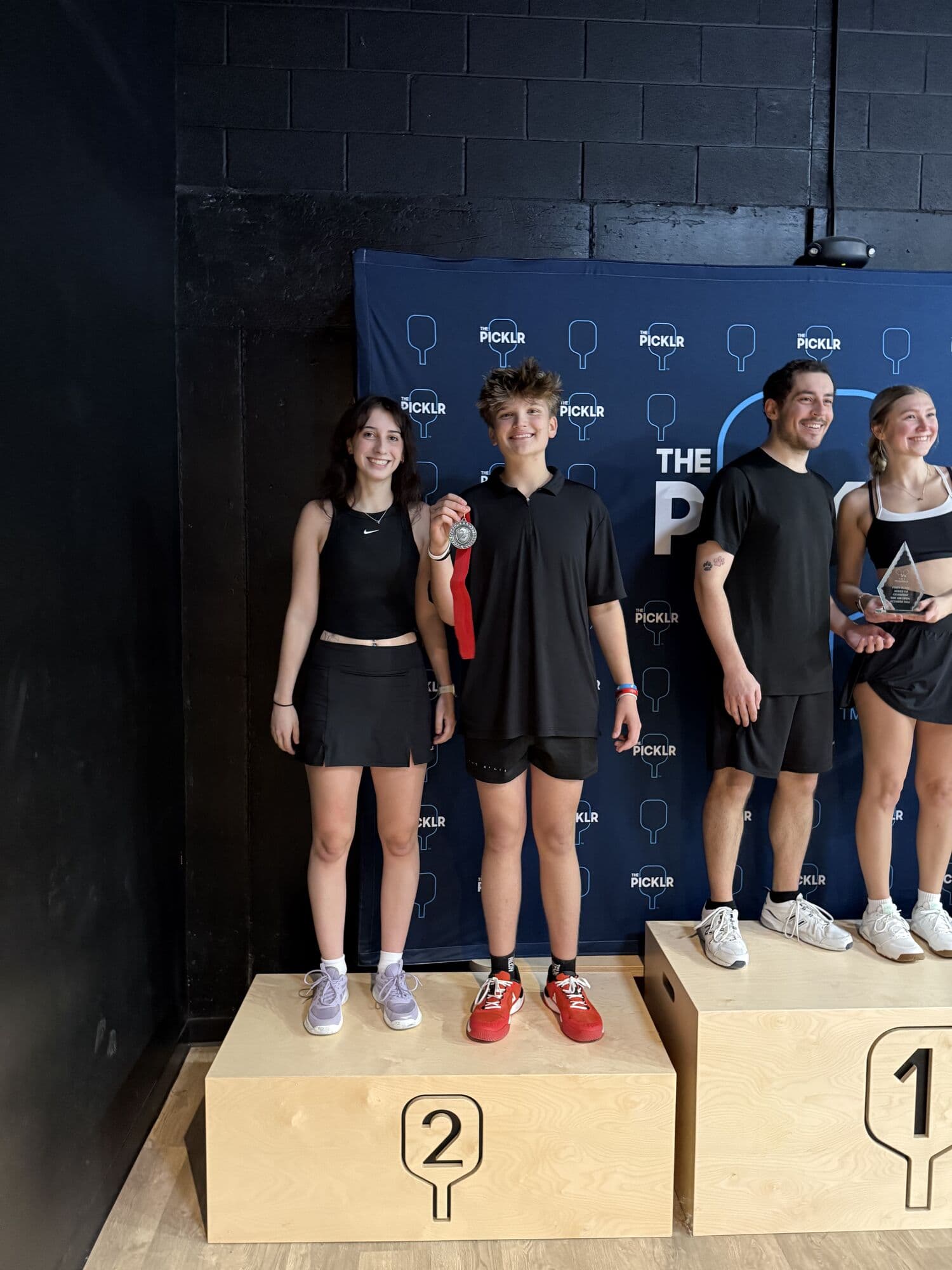 Mixed doubles medalists on the podium on Sunday morning