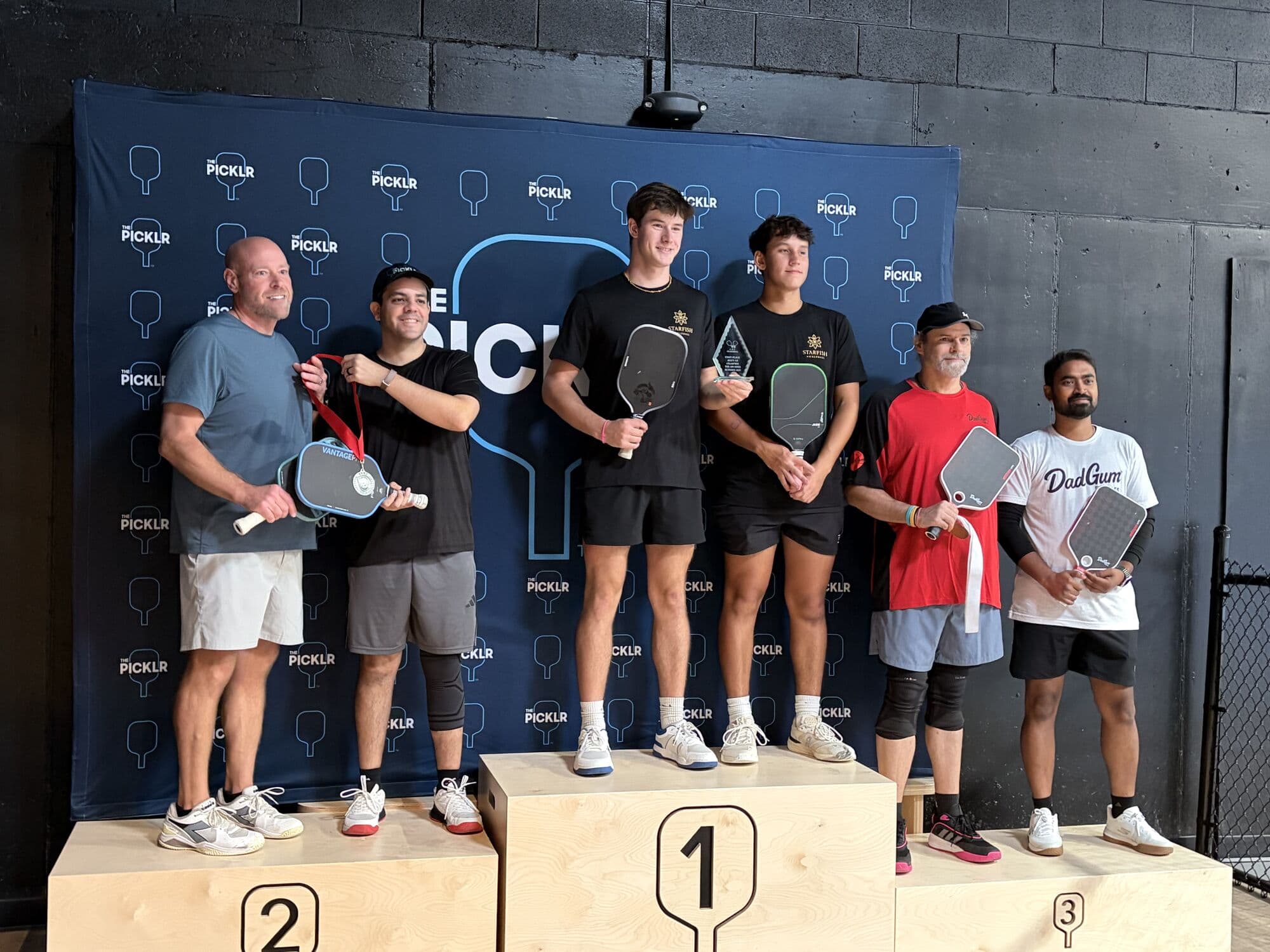 Men's doubles medalists on the podium on Saturday