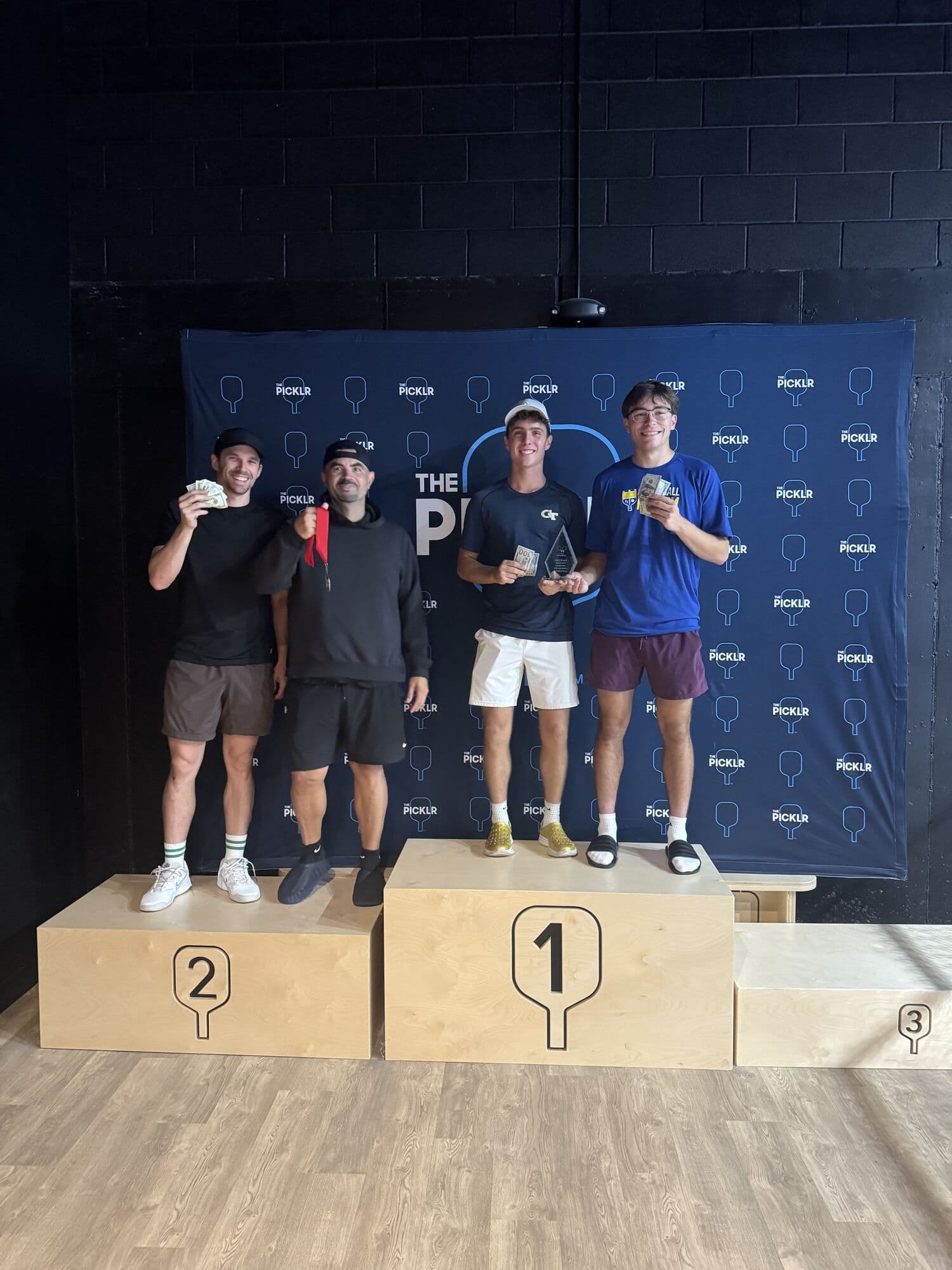 Men's doubles medalists on the podium on Saturday night
