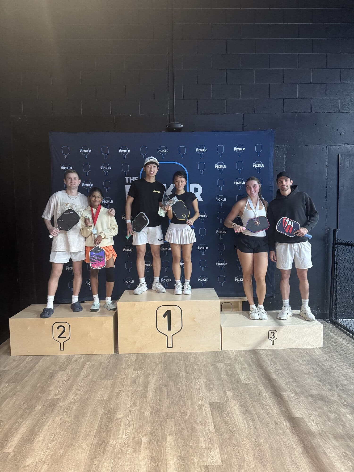 Mixed doubles medalists on the podium on Sunday afternoon