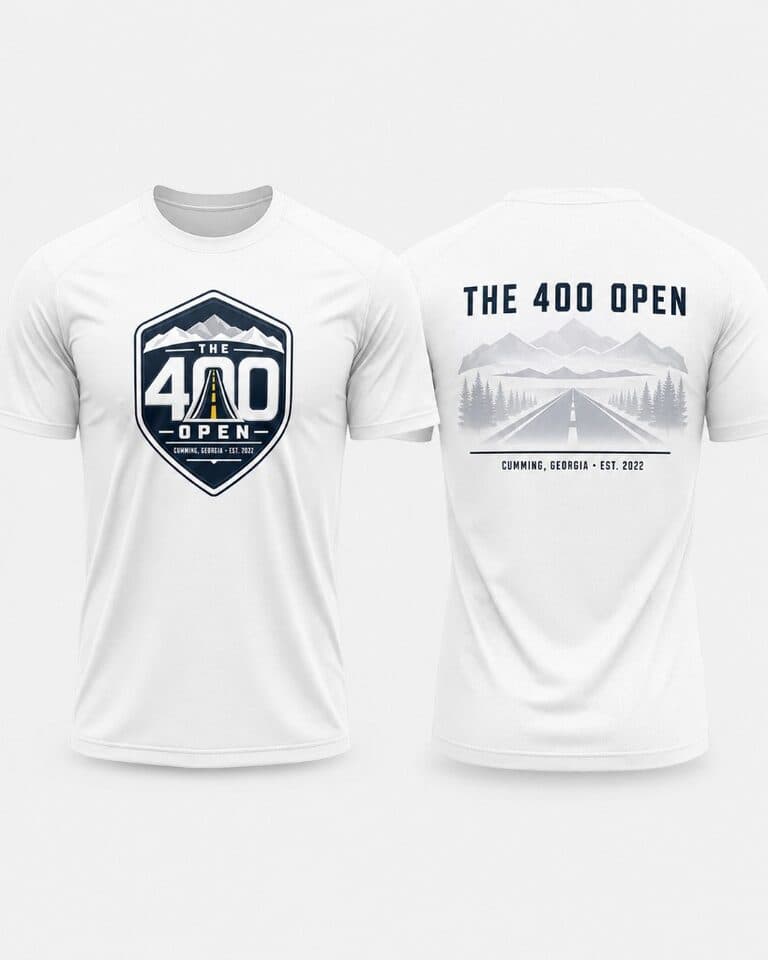 White performance tee with The 400 Open crest on the front and a mountain road graphic on the back