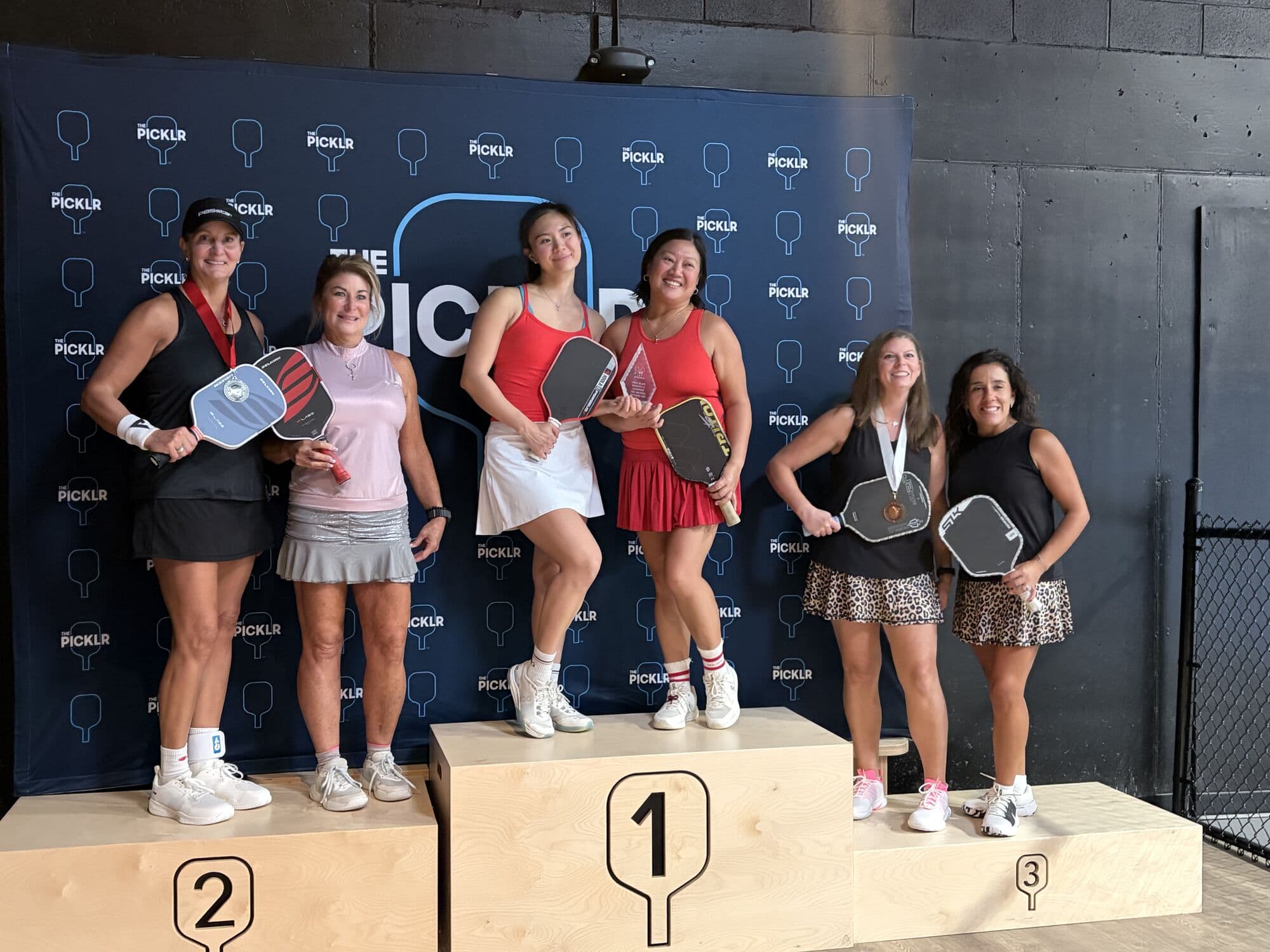 Women's doubles medalists on the podium on Saturday